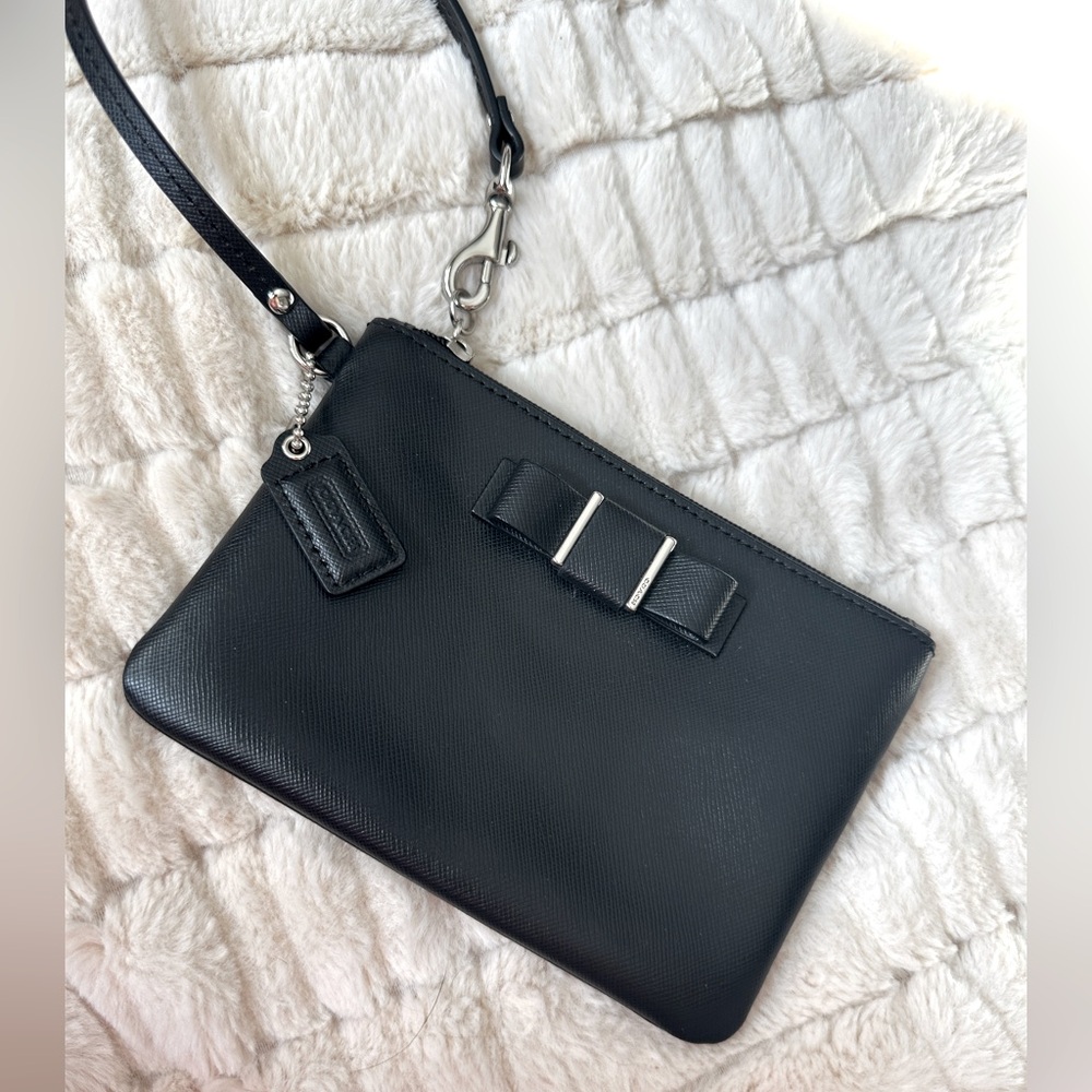 Coach Darcy Bow wristlet with bow. NWOT